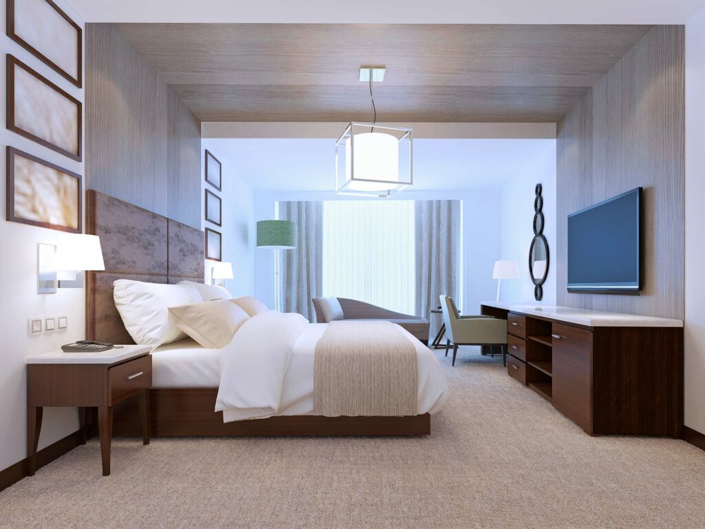 Carpet in a bedroom with a large king size bed by Select Floors in Marietta, GA.